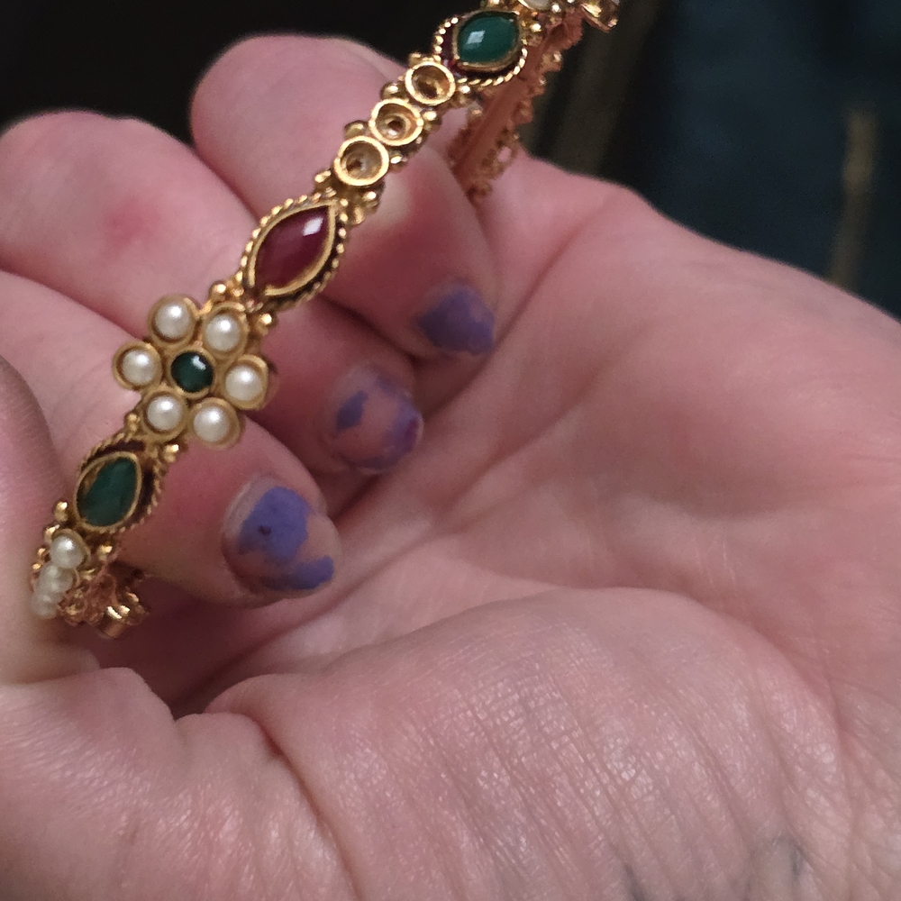 Elegant Gold and Green Bracelet